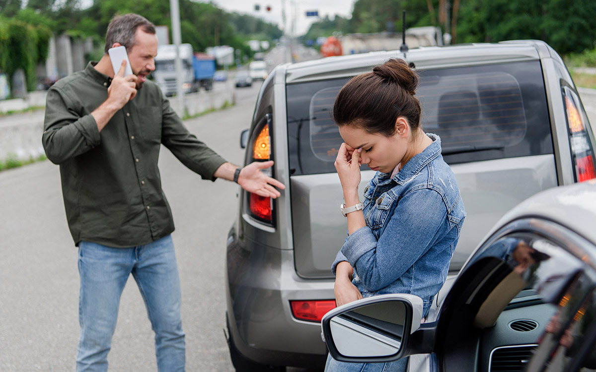 man on the phone after a car accident